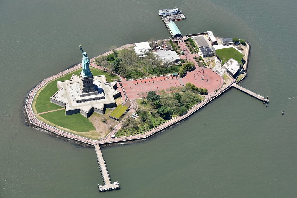 Statue of liberty, Statue, sculpture, Island, Boats, Building, Road, Trees, Water