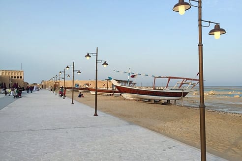 boats in a beach during daytime in tourist attractions in Al-Wakrah, Qatar.