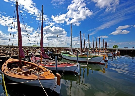 different colorful ships in a sea in  top attractions in Viborg, Denmark