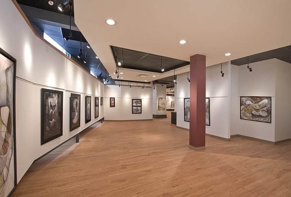 display of artworks in a white and brown building in one of the top things to do in Leamington, Canada