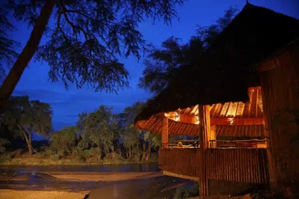 Samburu National Reserve view from a hut lit with warm lights