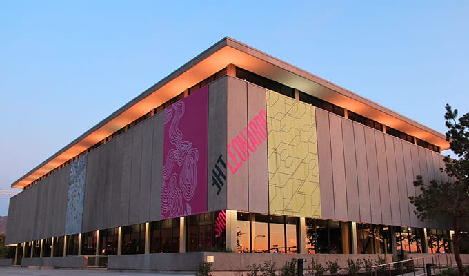 A multi coloured illuminated building